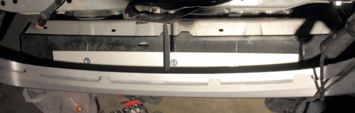 Metal backer with three sheet meal screws and washers